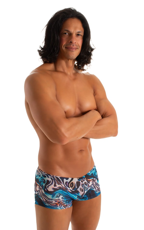 mens swimwear extreme low square cut swimsuit boxer trunks by skinz swimwear in Tan Through Aqua Leopard
