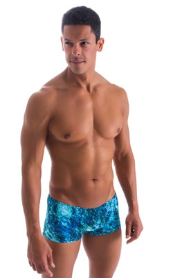 Extreme Low Square Cut Swim Trunks in Deep Glacier, Front View