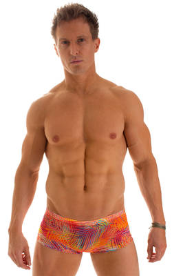 Extreme Low Square Cut Swim Trunks in Tan Through Orange Jungle, Front View