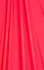 solid color light weight neon coral slinky and silky stretch swimwear fabric