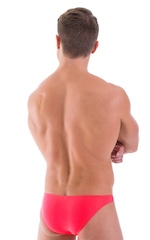 Comfort Pouch - Bulge Enhancing - Half Back Bikini in ThinSKINZ Semi Sheer Neon Coral, Rear View