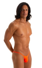 mens extreme micro string bikini tiny swimsuit by skinz swimwear in Blazing Orange